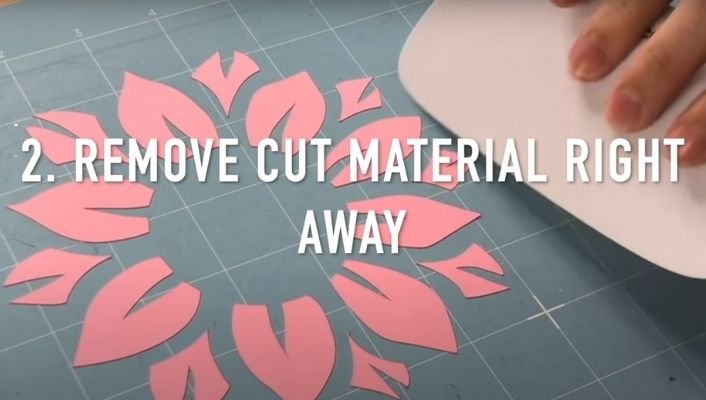 cleaning cricut mat	using plastic scrapper tool