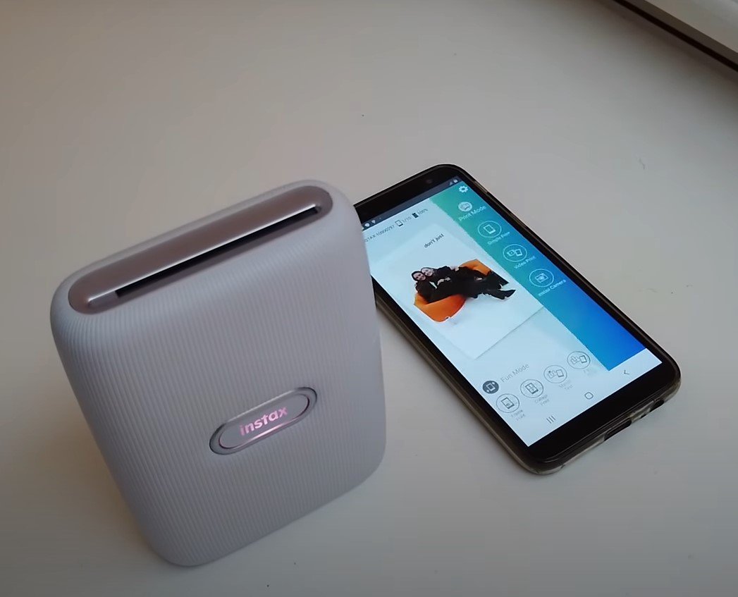 Best Portable Printer for Your Travel Journal? HP Sprocket vs Fuji